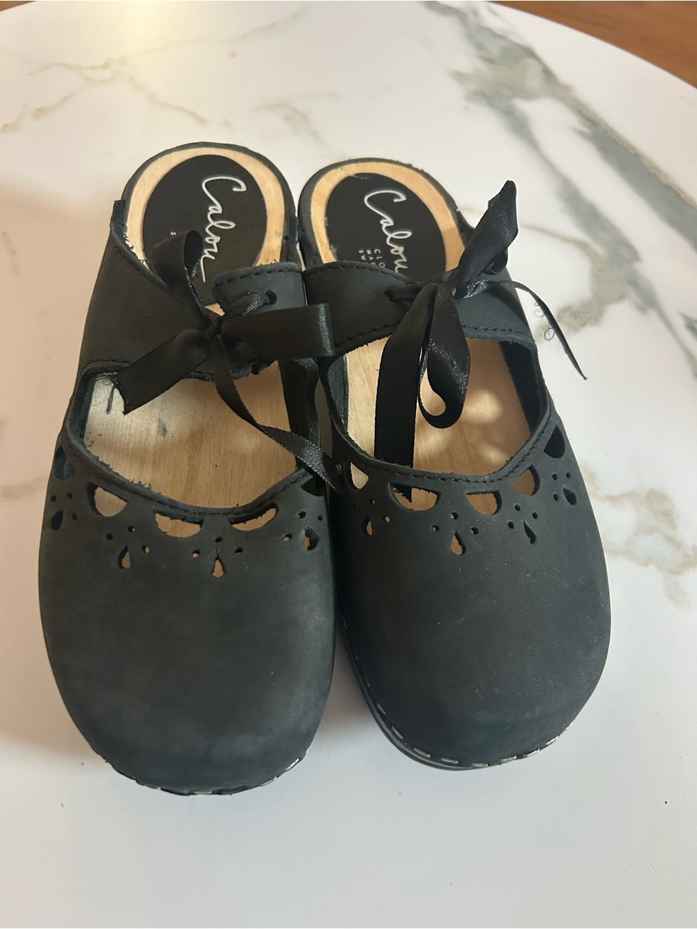 Calou Black Ribbon Tie Cutout Clogs